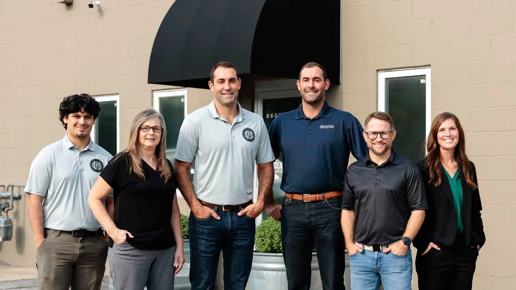 The DGR Painting Contractors team outside their Omaha office on I Street